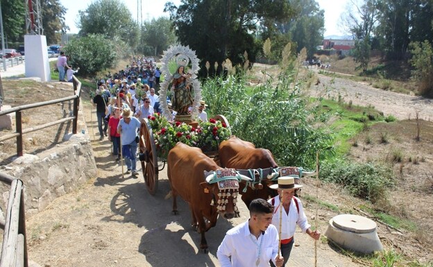 Pilgrims on route to the Parque El Esparragal during the romeria in 2019. /SUR