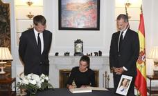 Spanish monarchs and prime minister sign book of condolence in Madrid