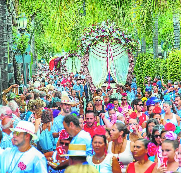 Thousands of people enjoy the traditional romeria in Torremolinos. 