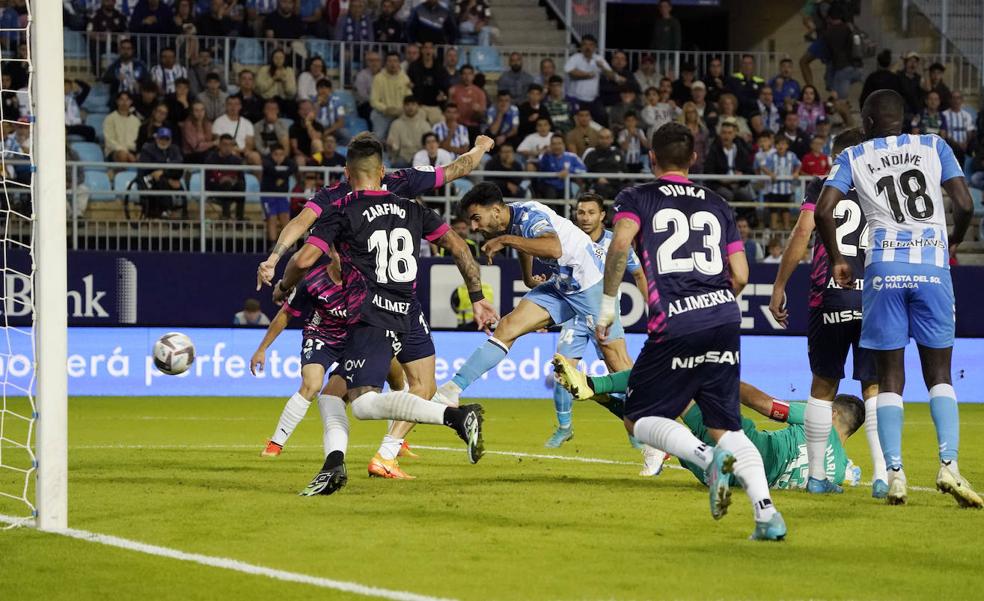 Malaga CF save a point with a late goal