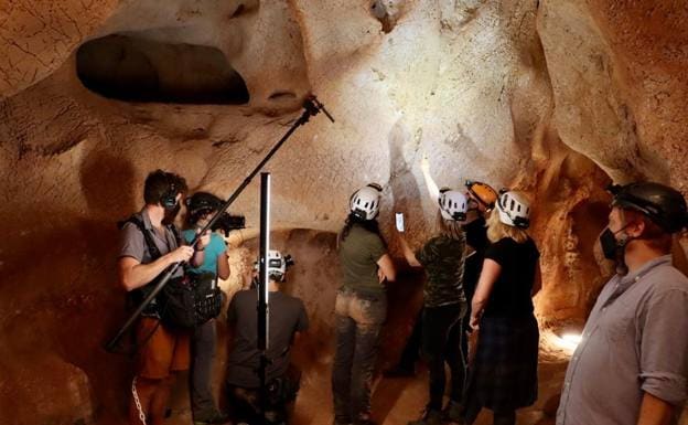 The National Geographic film crew inside the cave 
