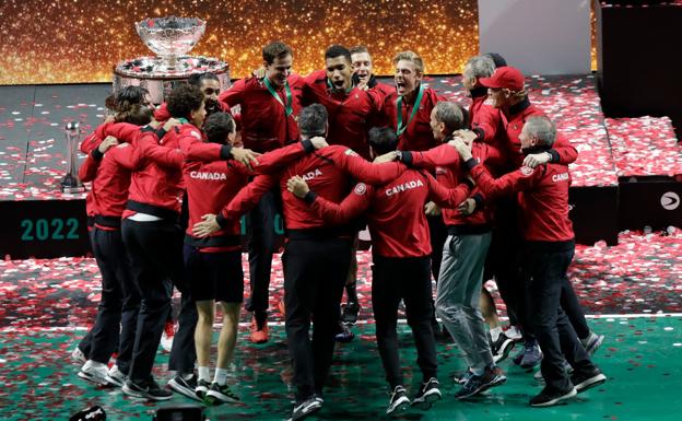 The Canadian national team celebrates winning their first Davis Cup title. 