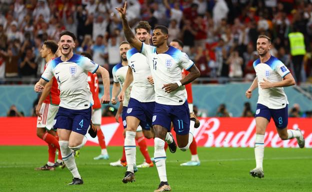 Marcus Rashford celebrates scoring the opening goal for England against Wales. /REUTERS
