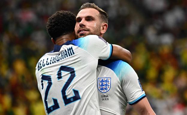Jordan Henderson and Jude Bellingham celebrate England's opening goal against Senegal. 