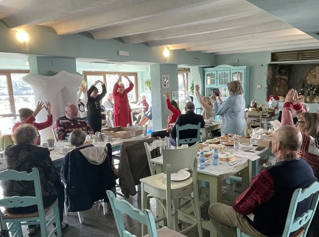 Singing and fundraising at RBL Christmas party