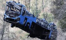 Death toll rises to seven after bus plunges 30 metres from bridge into flooded river in Spain