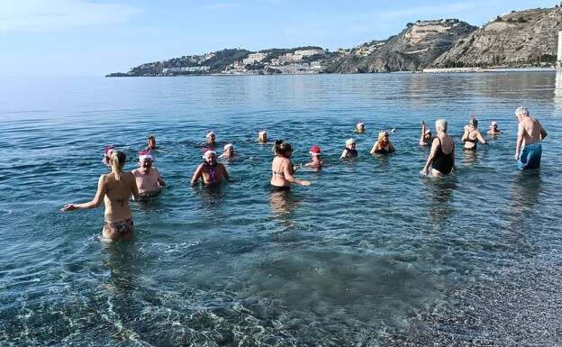 The Swedish tourists enjoyed the mild temperatures for their traditional New Year's Day swim 