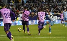Malaga remain in deep trouble despite comeback draw