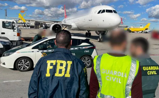 FBI agents and Guardia Civil officers at Adolfo Suárez–Madrid Barajas Airport 