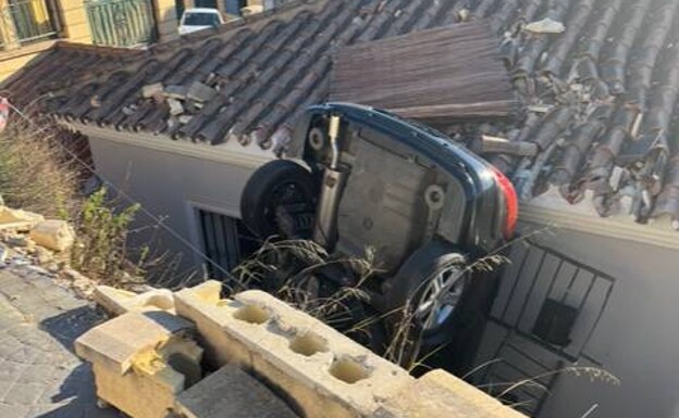 Lucky escape as car crashes through wall and ends up wedged against property in Mijas