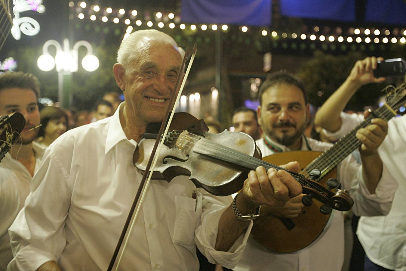 Fotos del ambiente en el Real de la Feria la noche del viernes 21
