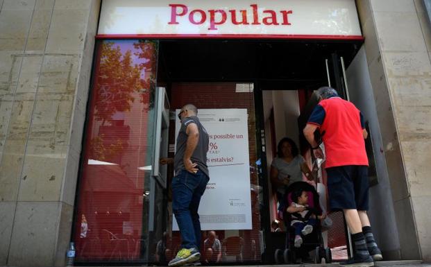 Competencia vigilará los efectos de la compra del Popular