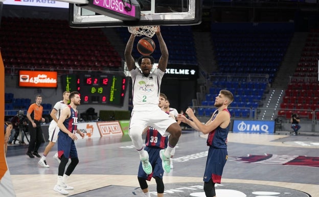 Defensa y festival de triples para doblegar al Baskonia