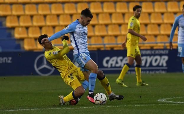 El Málaga se salva de jugar en Nochevieja