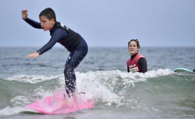Oficios de verano: cobrar en olas