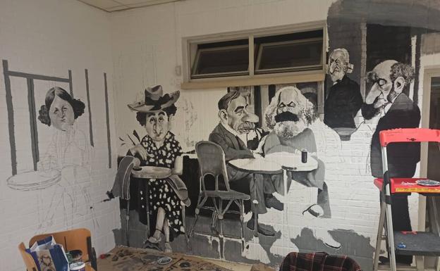 El dibujante gráfico Ángel Idígoras lleva a figuras de la economía mundial a las paredes de la universidad