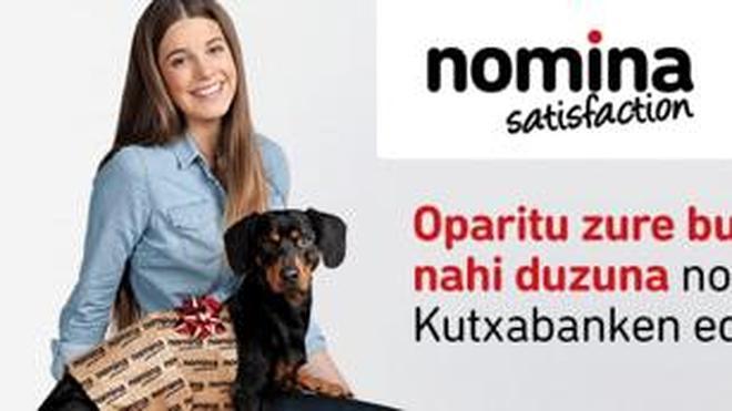 Kutxabank retira una campaña de publicidad con un perro envuelto como regalo
