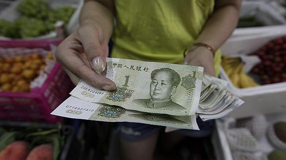 China intenta reactivar su economía con una nueva devaluación del yuan