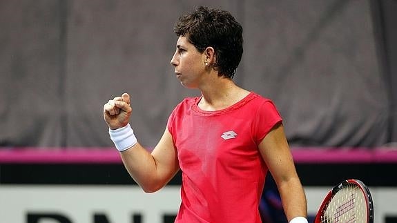 Muguruza y Suárez dan un paso adelante contra Serbia