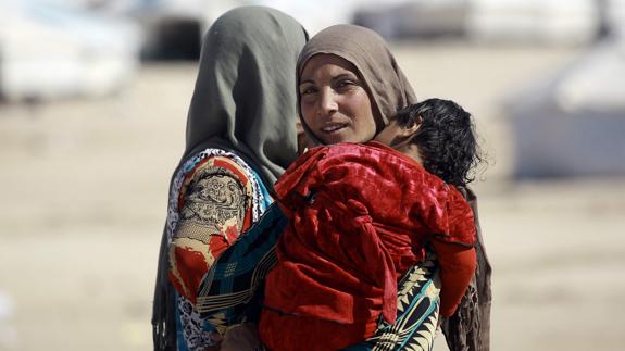 Hallan una fosa común con más de cien cadáveres en Mosul